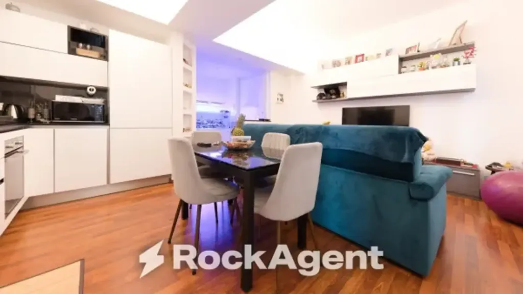 Living Room - Penthouse Apartment with Balcony in Genoa