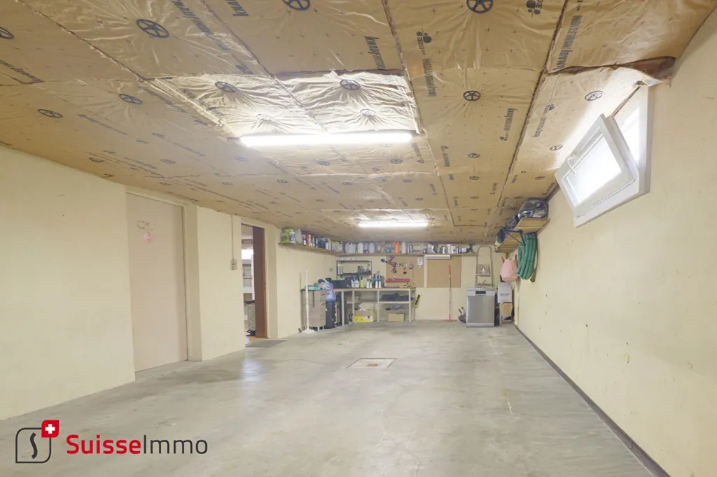 Garage - Maison avec Grand Terrain et Terrasse à Nommay