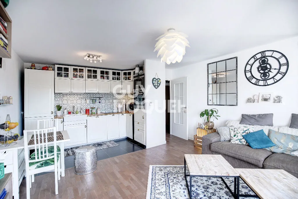 Séjour - Appartement 3 Pièces avec Balcon à l'Ouest au Centre-Ville