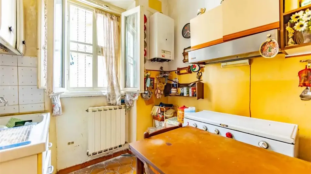 Kitchen - Three-Bedroom Apartment in Tivoli