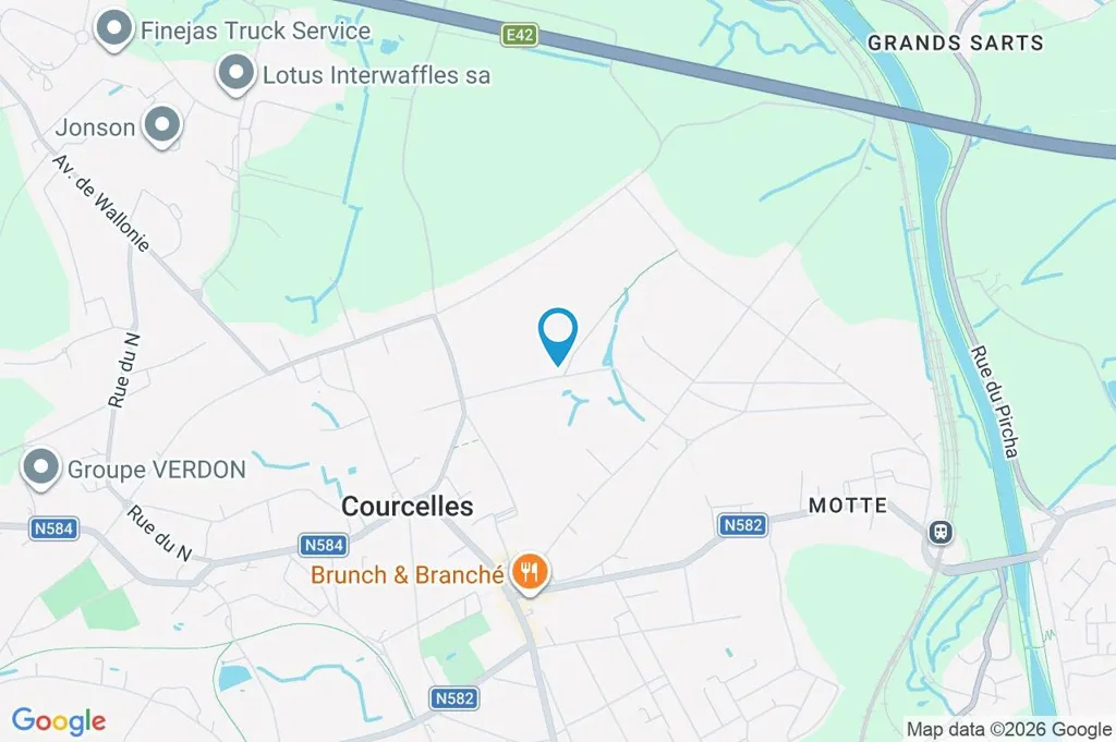 House with Photovoltaic Panels in Courcelles