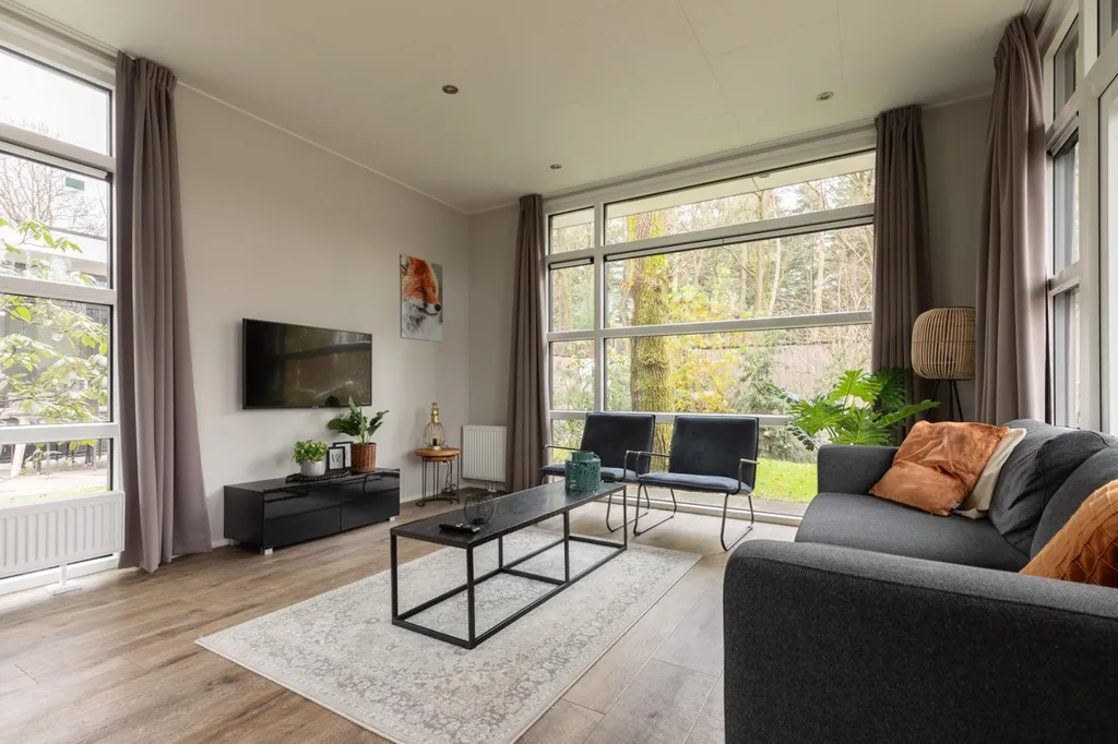Séjour - Modern Chalet with Garden in Lunteren