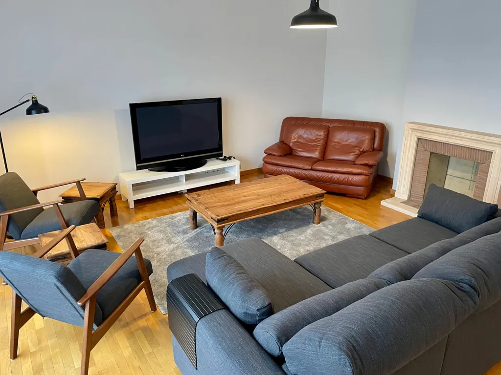 Séjour - Appartement Élégant avec Terrasse dans le Quartier des Ambassades