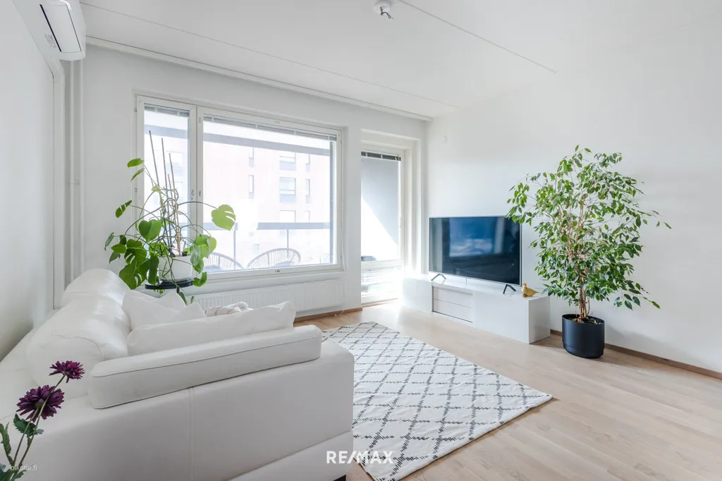 Living Room - Modern Apartment with West-Facing Terrace in Länsi-Pasila