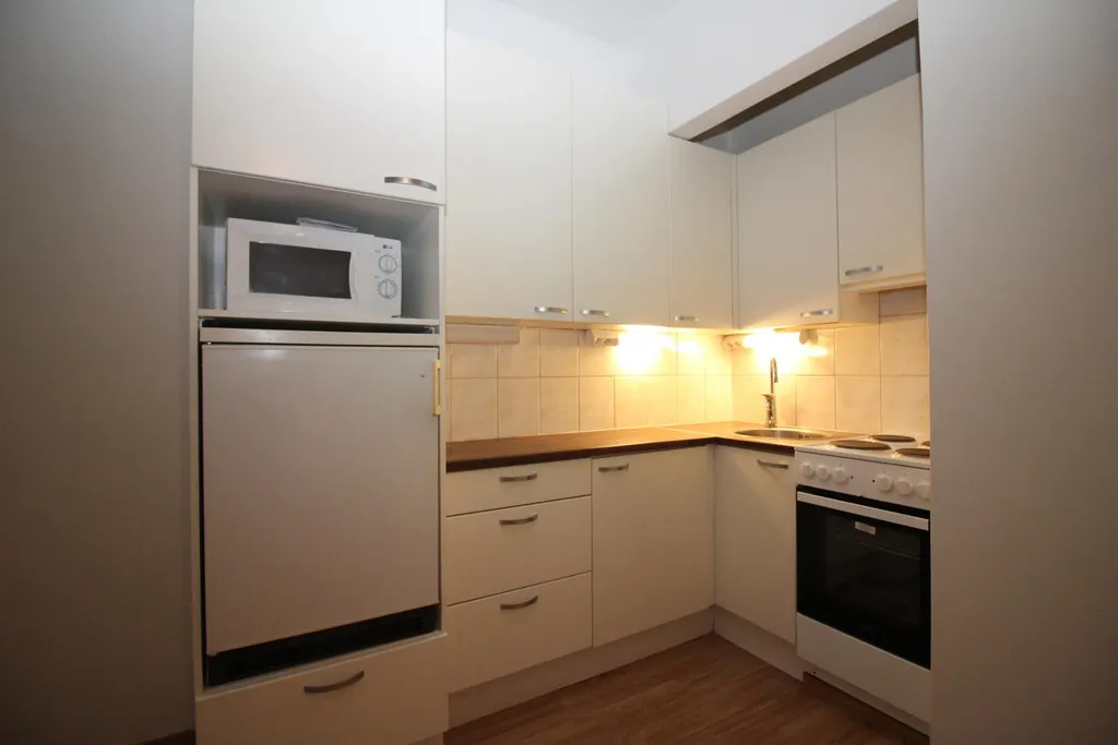 Cucina - Bright 4th Floor Flat with Garden in Pori Centre