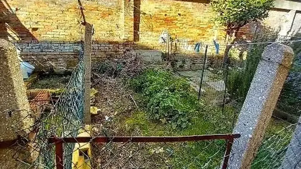 Garden - Three-Bedroom Apartment with Private Garden in Osimo
