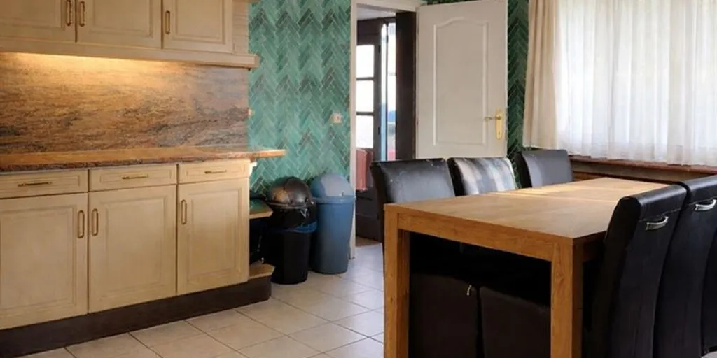 Sala da pranzo - Renovated House with Large Garden in Putte