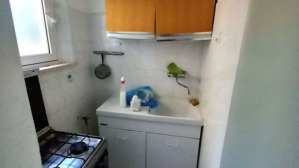 Kitchen - Three-Bedroom Apartment with Private Garden in Osimo