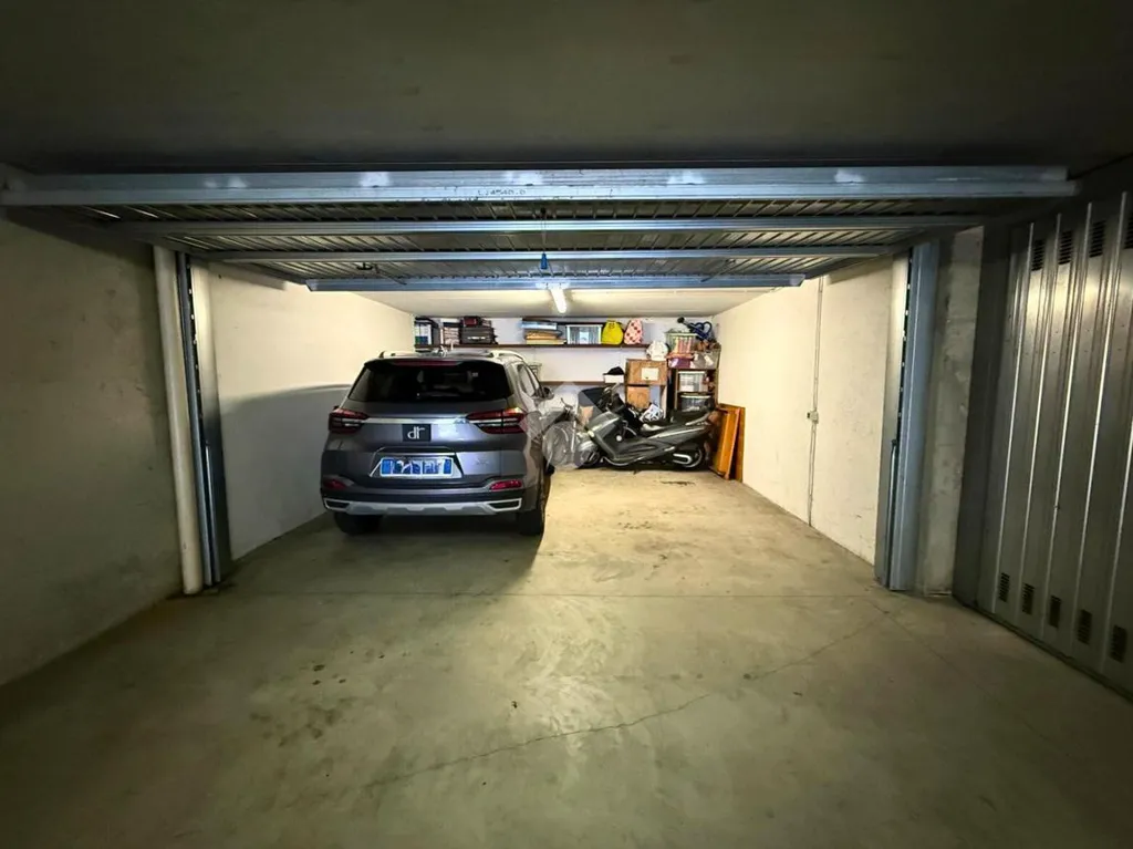 Garage - Modern Apartment with Balcony in Capriolo