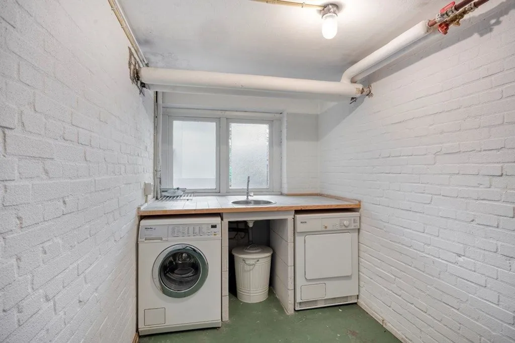 Pesuköök - Bright Two-Bedroom Portiekflat in Benoordenhout