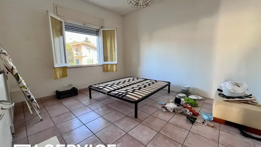 Chambres - Three-Bedroom Apartment with Balcony in Cervia