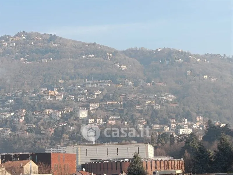 Restored Apartment with Balconies in Como Borghi