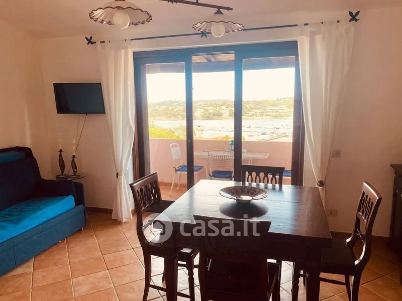Dining Room - Apartment with Balcony and Pool in Arzachena