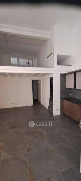 Kitchen - Elegant Trilocale with Private Patio in Como