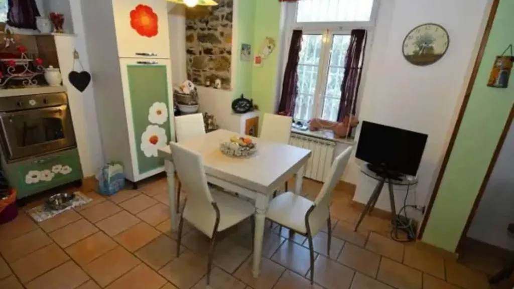 Salle à manger - Rustic-Style Apartment with Garden in Genoa