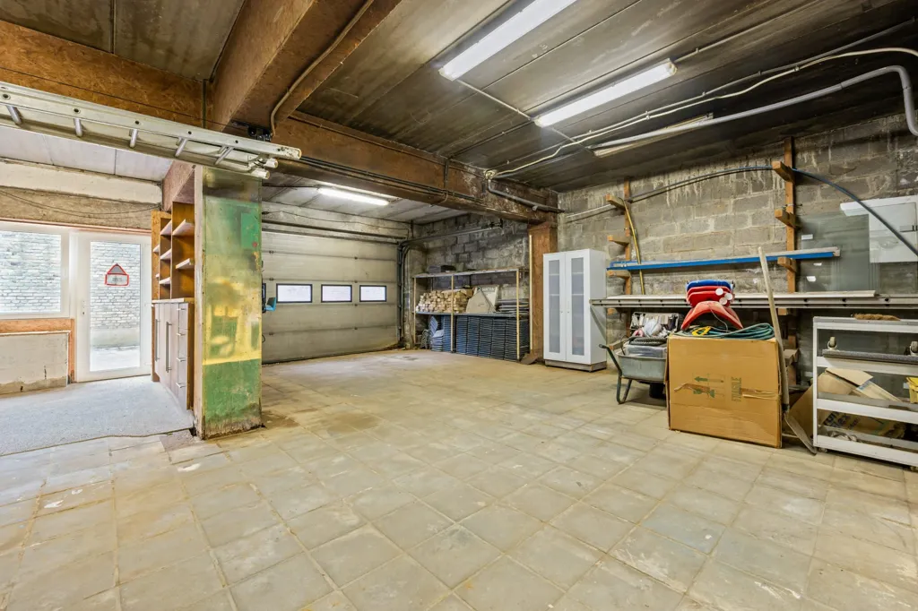 Garage - Villa with Playful Architecture in Nieuwerkerken