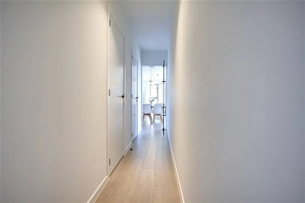 Esik - Energy-Efficient Apartment with River View in Boom