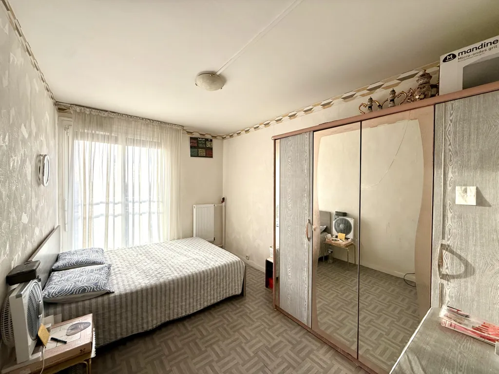 Chambres - Appartement avec Balcon et Cave au Centre de Sevran