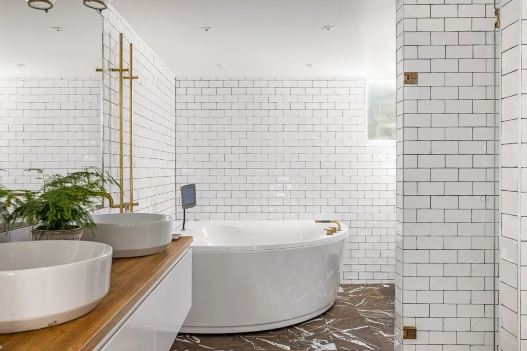Bathrooms - Modern Apartment with Mälaren View in Mälarhöjden