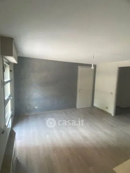 Living Room - Two-Level Apartment with Balcony in Modena