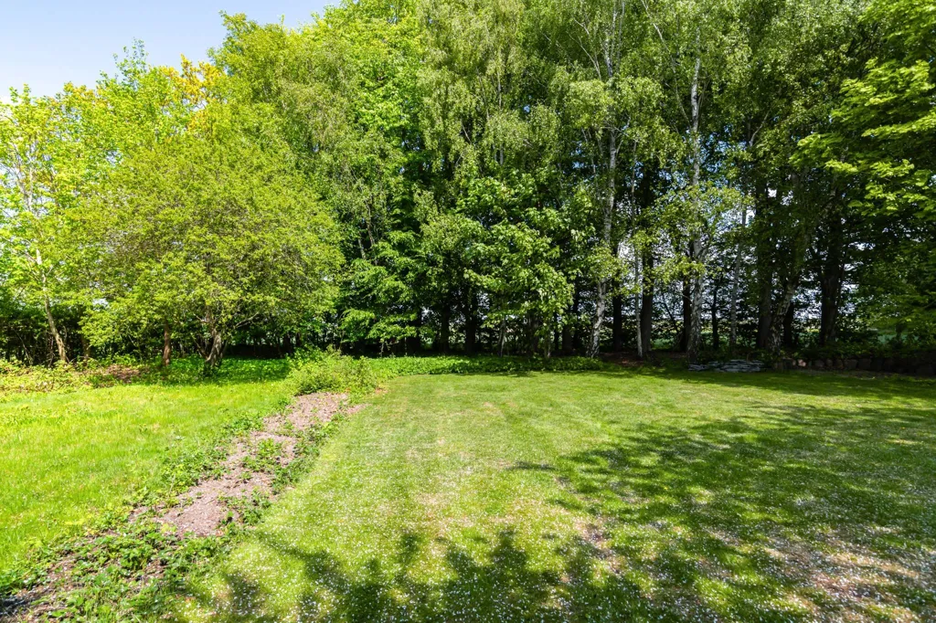 Jardin - Charming Villa with Park-like Garden in Härslöv