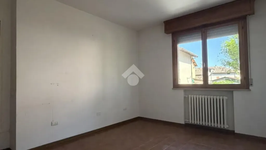Rooms - Two-Bedroom Apartment with Balcony in Cavriago