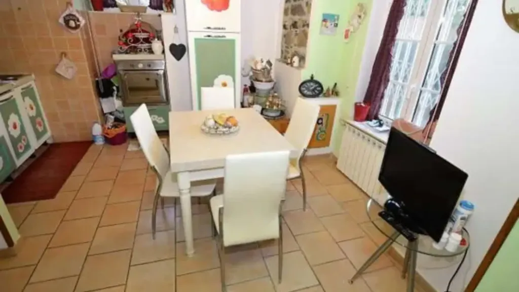 Salle à manger - Rustic-Style Apartment with Garden in Genoa