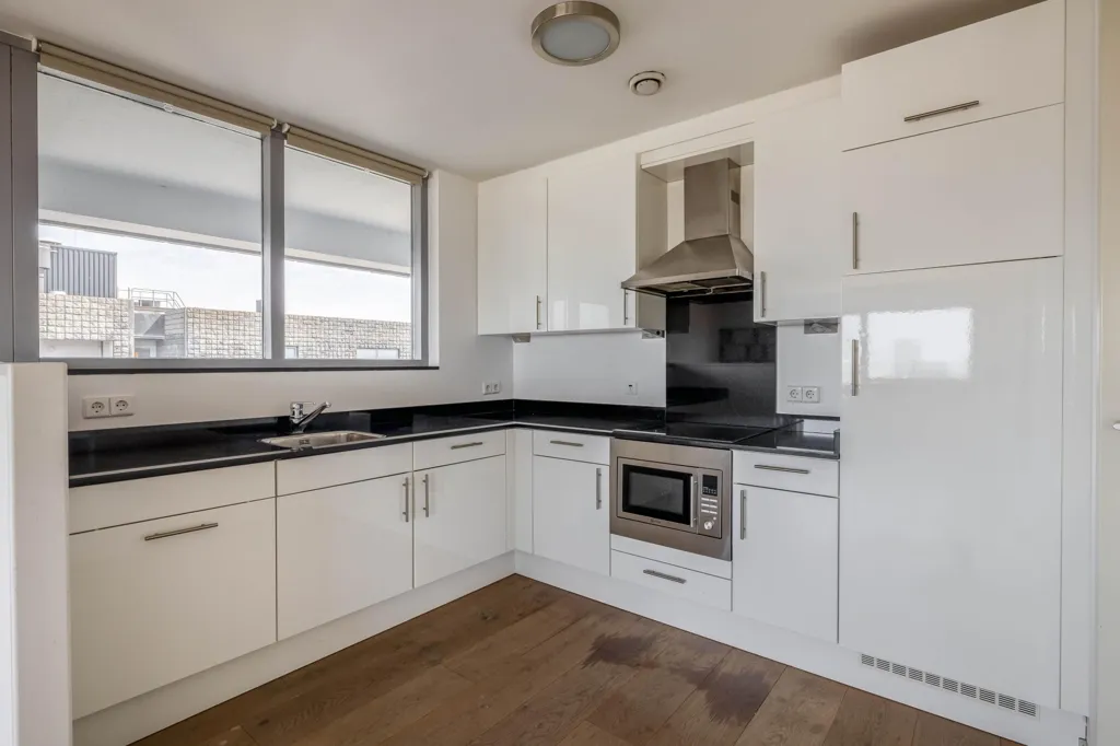 Cucina - Modern Apartment with City View in Rotterdam