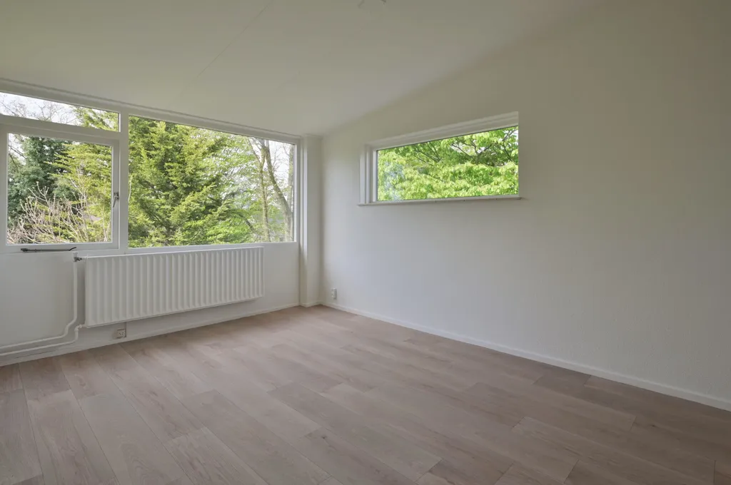 Rooms - Corner House with Energy Label A in Huizen