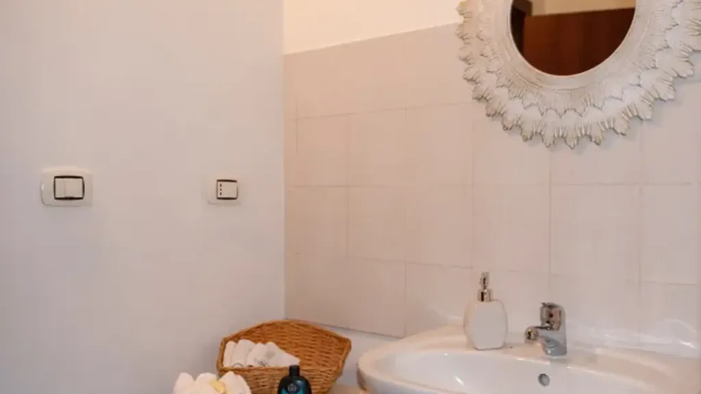 Bathrooms - Modernised Apartment with Balcony in Messina