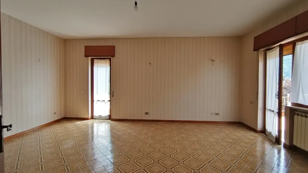 Séjour - Three-Bedroom Apartment with Balcony in Solofra