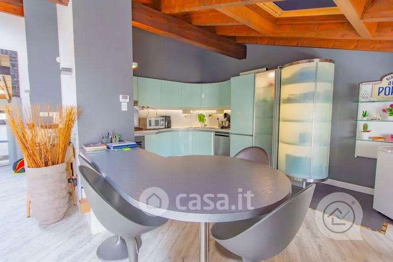 Söögituba - Mansarded Penthouse with Sky Views in Varese