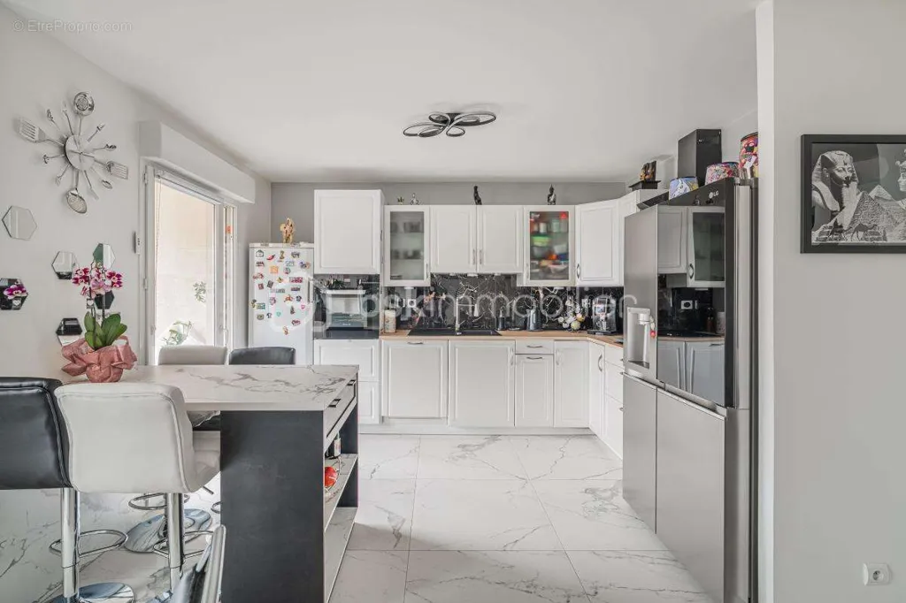 Cuisine - Appartement Rénové avec Balcon et Vue Dégagée en Centre-Ville