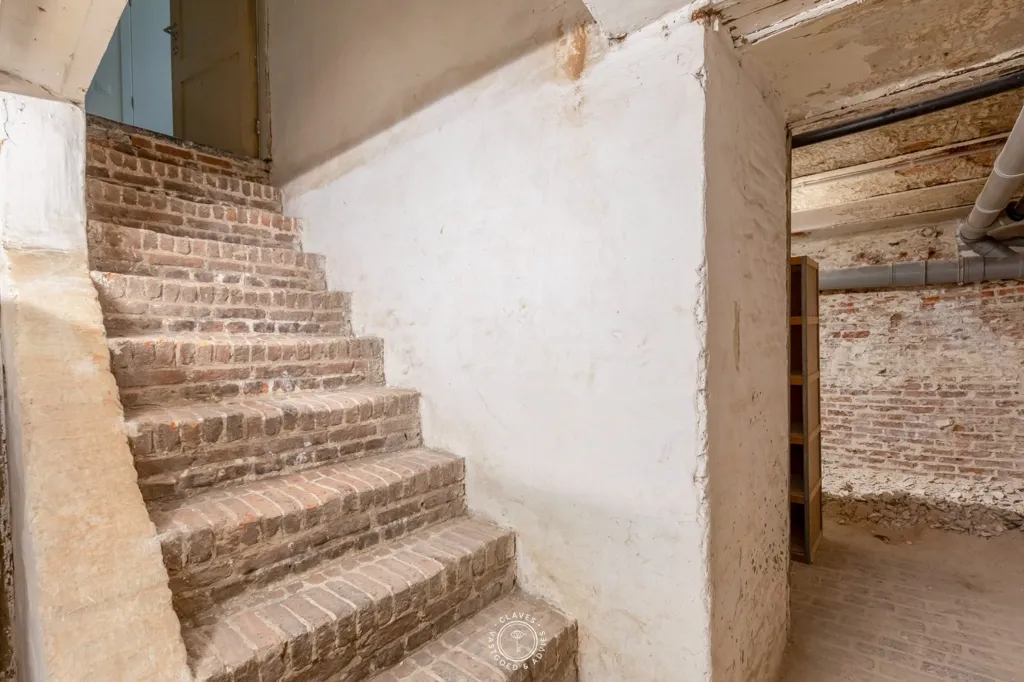 Pièces - Appartement au Rez-de-Chaussée avec Terrasse dans le Centre-Ville