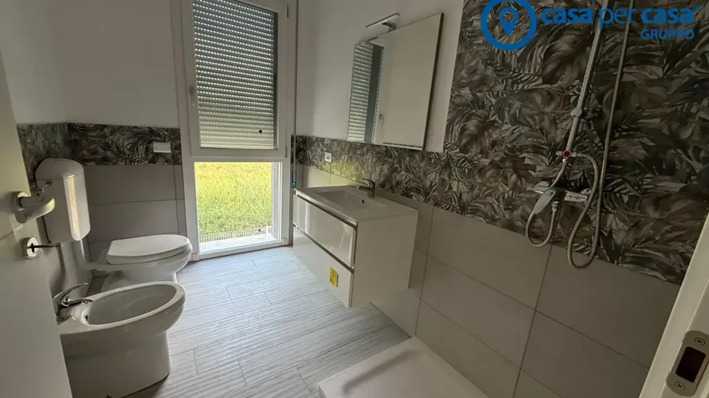 Salles de bain - Newly Built Apartment with Private Garden in Porto Viro