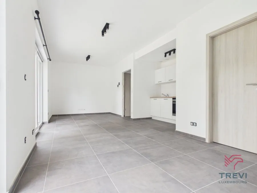 Séjour - Studio Neuf avec Jardin à Arlon