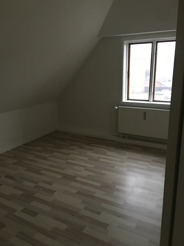 Pièces - Light-Filled Flat with Harbour View in Svendborg