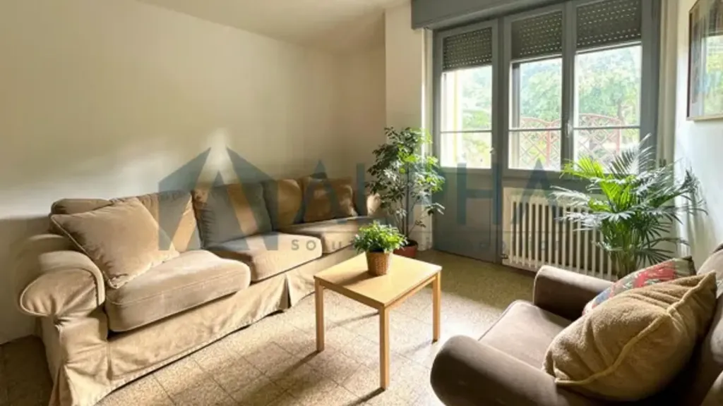 Living Room - Three-Bedroom Apartment with Balcony in Forlì