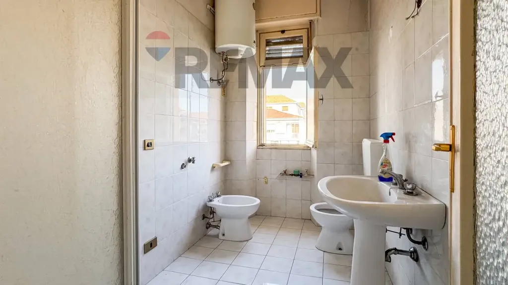 Bathrooms - 2-Bedroom Apartment for Renovation in Vercelli