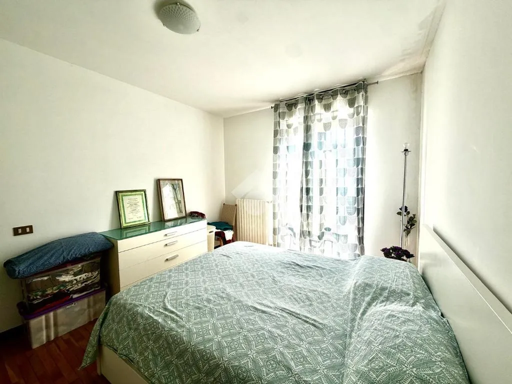 Camere da letto - Three-bedroom Apartment with Balcony in Brescia