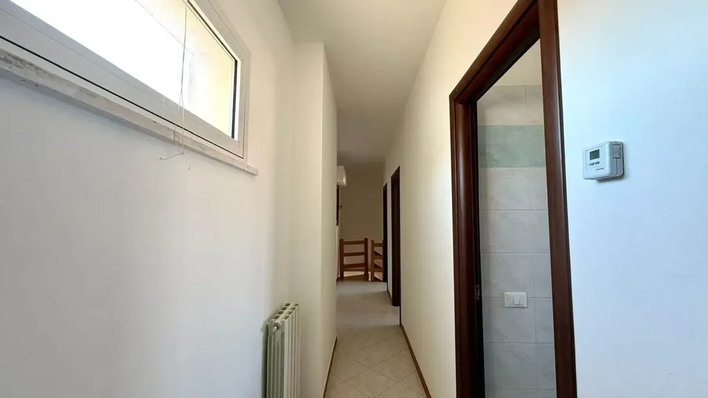 Esik - Two-Level Apartment with Terrace in Cecina