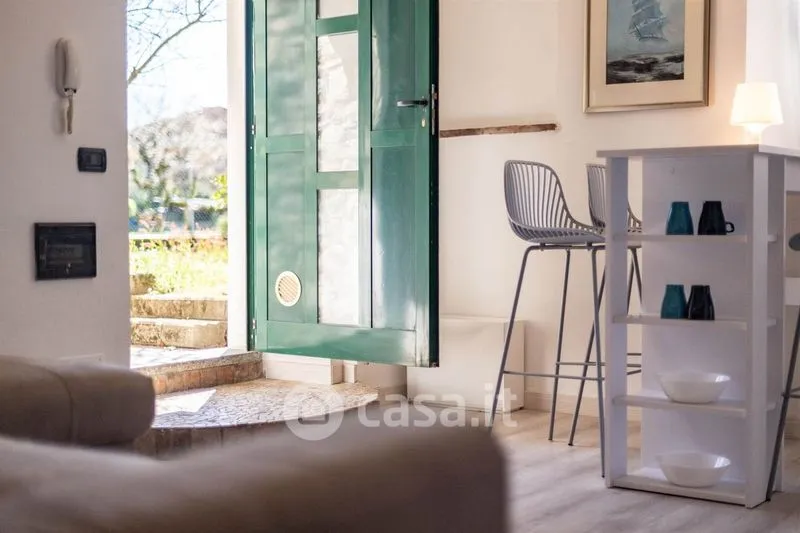 Séjour - Modern Studio with Garden View in Borgomanero