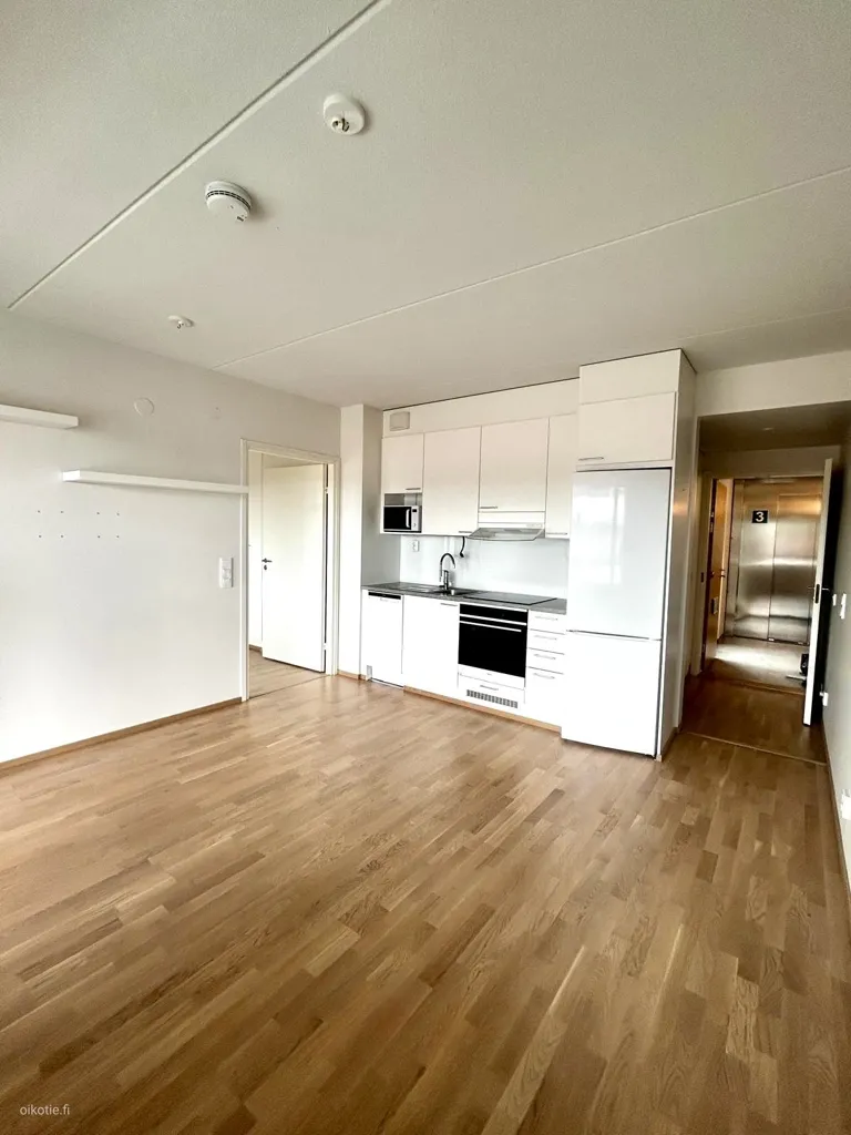 Kitchen - Bright Apartment with Balcony in Nummela