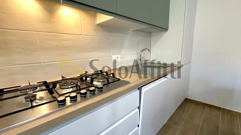 Kitchen - Ristrutturato Appartamento with Balcony in Forli'