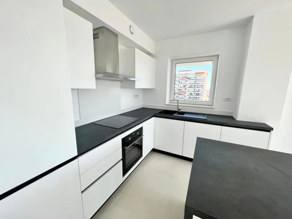 Cuisine - Appartement Moderne avec Terrasse au 5ème Étage