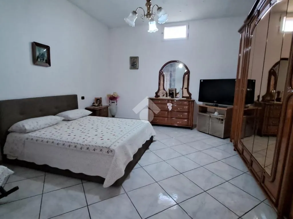 Bedrooms - Three-Bedroom Apartment with Fireplace in San Marcellino