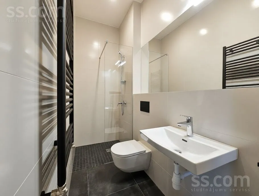 Salles de bain - Three-Bedroom Apartment with Central Location in Riga
