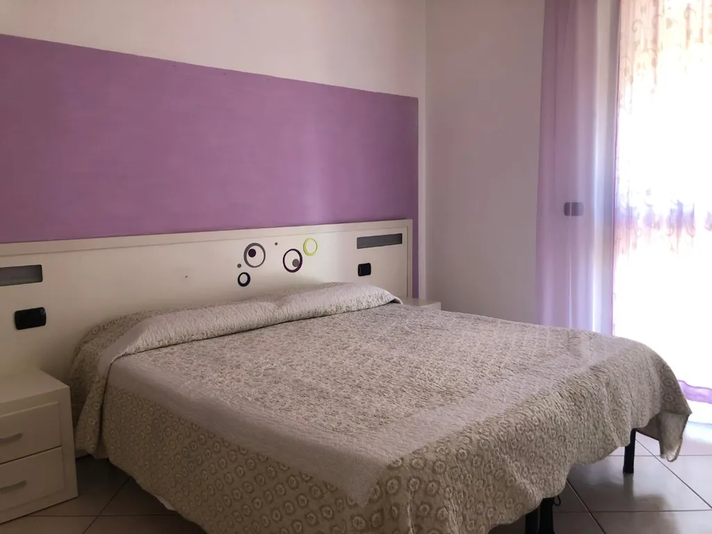 Bedrooms - Serviced Apartment with Terrace in Tirrenia, Pisa