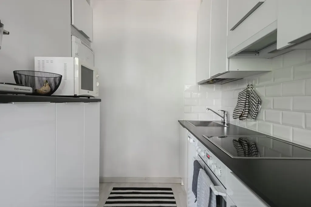 Köök - Bright Apartment with Balcony in Lahti Centre