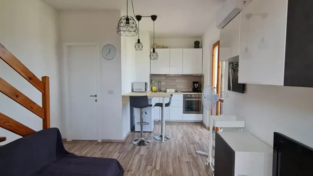 Living Room - Three-Bedroom Apartment with Balcony in Numana